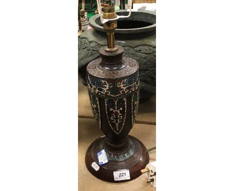 A Chinese chocolate patinated bronze and cloisonne decorated vase-shaped table lamp the main body with lotus leaf design rais