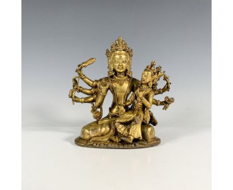 18th century, small statue of multi armed and head goddess holding the tools of man, with separated goddess figure seated. Is