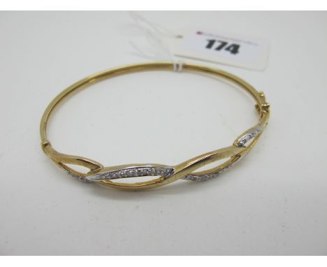 A Modern 9ct Gold Bangle, of openwork design with inset highlights, hinged to snap clasp (internal diameter 6cm) (4.5grams). 