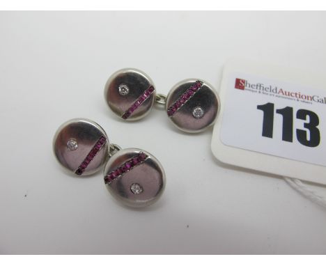 A Pair of Art Deco Diamond Set Gent's Cufflinks, the circular panels rubover set with old cut stones, on chain connections (i