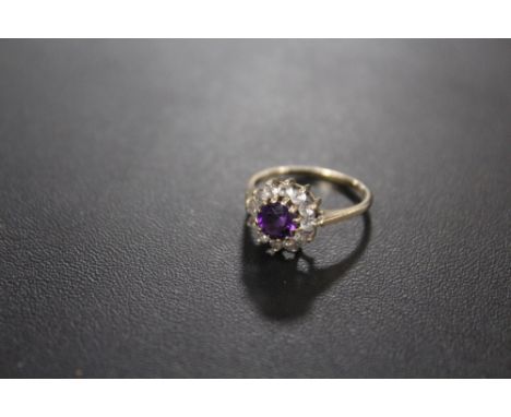 A VINTAGE AMETHYST SET DRESS RING - HALLMARKS INDISTINCT