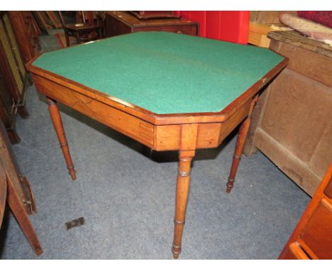 AN ANTIQUE MAHOGANY FOLD-OVER CARD TABLE