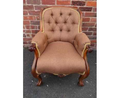 A VICTORIAN MAHOGANY FRAMED LADIES BUTTON BACK ARMCHAIR