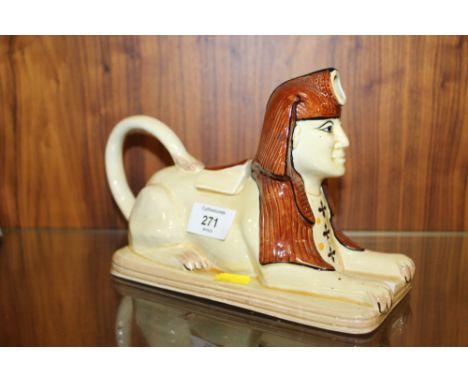 A NOVELTY VINTAGE TEAPOT IN THE FORM OF A SPHINX 