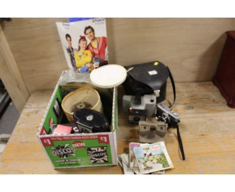 A QUANTITY OF VINTAGE CAMERA EQUIPMENT TO INC A POLAROID SWINGER II EXAMPLE 