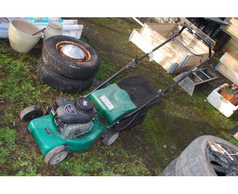 A Qualcast 450 self propelled mower with grass box, 148 cc engine, good compression.