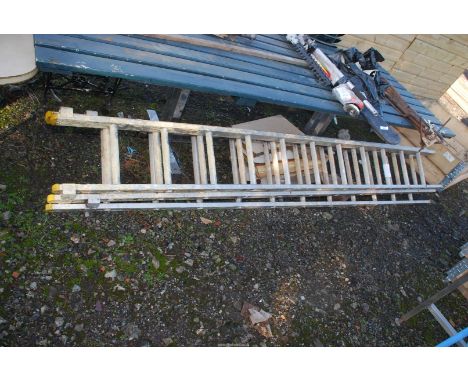 An 11 rung three stage aluminium ladder.