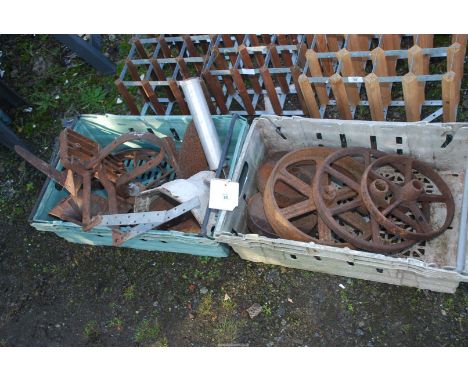 Cast iron wheels and hopper, cultivator part etc., in 2 boxes.