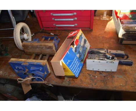 An Agojama 240 volt sander and a carpenter's Rolson 9" bench vice.