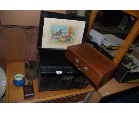 A metal trunk, wooden box, painting, books and metal hooks, etc.