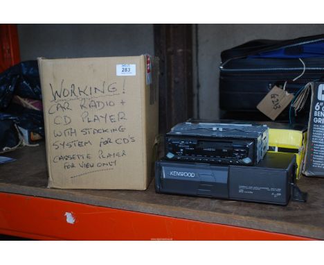 A Kenwood car radio with CD autochanger.