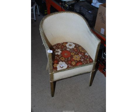 A Lloyd Loom style Commode.
