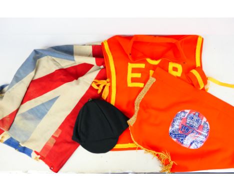 A vintage Union flag, approximately 100 cm x 140 cm, a Silver Jubilee banner and similar. [W]

PLEASE NOTE: ALL LOTS NEED TO 