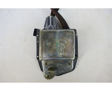 A London punch ticket machine, Bell Punch serial number 41870, with leather strap. [W]

PLEASE NOTE: ALL LOTS NEED TO BE COLL