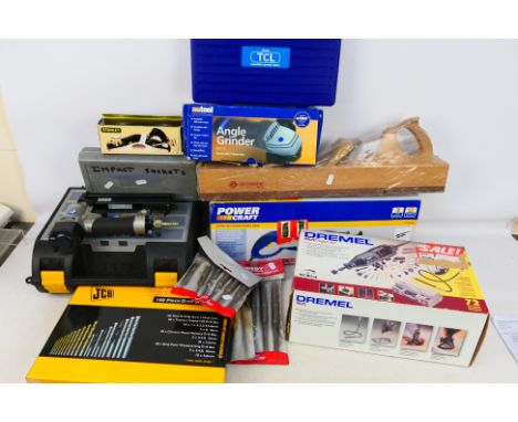 Various tools to include angle grinder, multi tool kit, drill bit set, glue gun and other. [2]. [W]

PLEASE NOTE: ALL LOTS NE