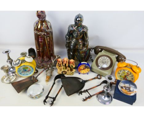 Lot to include a vintage dial telephone, alarm clocks, knight form fireside companions and other. [W]

PLEASE NOTE: ALL LOTS 
