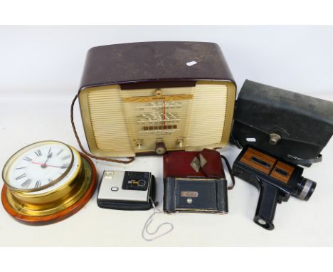Lot to include a vintage Murphy radio, cameras and clock. [W]

PLEASE NOTE: ALL LOTS NEED TO BE COLLECTED OR DESPACTHED BY 12