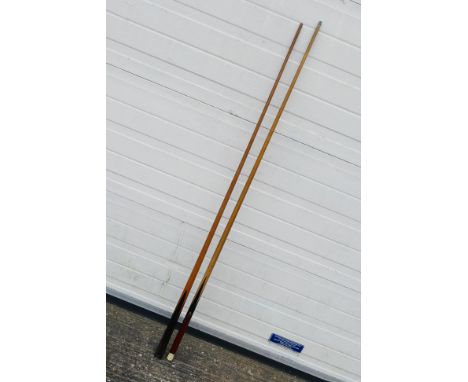 A vintage one piece snooker cue with maker's plaque inscribed Fred Davis Champion Cue and one other, largest approximately 14