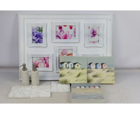 A multi photo frame (4 x 10cm x 15cm, 2 x 13cm x 18cm), 3 x decorative wall tiles (15cm x 15cm), 2 x ceramic soap / shampoo d