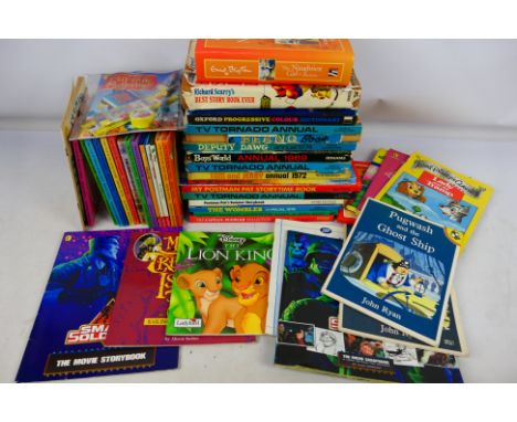 A collection of vintage children's books including Tom and Jerry, Thunderbirds, Deputy Dawg, Enid Blyton, Beatrix Potter and 