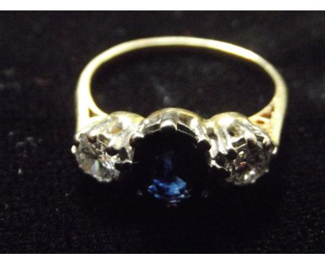 Sapphire and diamond rind, two diamonds approx 0.25ct each. Sapphire with a slight chip and a few scratches. Size M