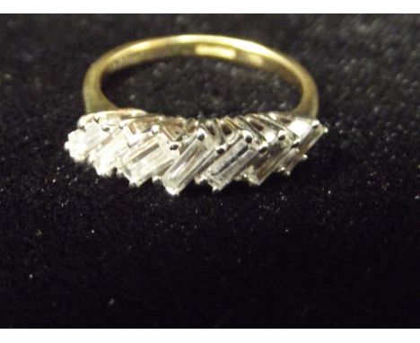 18ct gold diamond ring set with 7 baguette cut diamonds size K