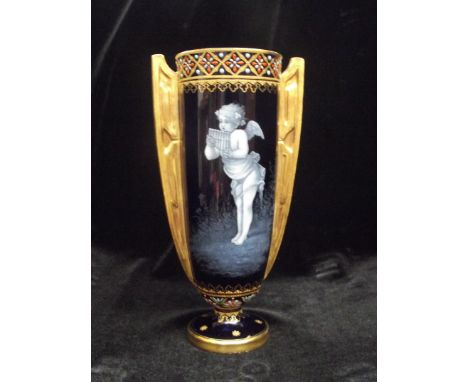 Late 19th century Coalport pate-sur-pate vase depicting a cherub playing panpipes, numbered A9205, height 16cm, (evidence of 
