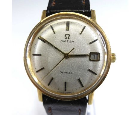 An Omega DeVille gent's 9ct gold cased manual wind wristwatch, having a signed silvered dial with baton markers, centre secon