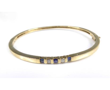 A 9ct gold sapphire and diamond set hinge bangle, arranged as five alternating small round cuts, sponsor GJ, 6cm, 9.6g