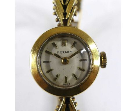 A vintage lady's Rotary 18ct gold bracelet cocktail watch, having a signed champagne dial, manual wind movement, on integral 