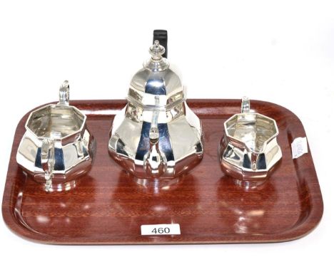 A matched silver three piece tea service 