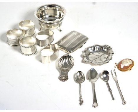 A quantity of silver items including five silver napkin rings, cigarette leaf form pin tray, tea caddy spoon, footed bowl etc