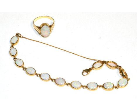 A 9 carat gold opal bracelet, oval cabochon opals in rubbed over settings as individual links, length 18.5cm and an opal ring