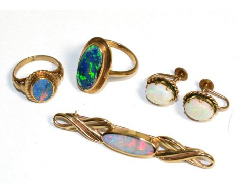 A black opal ring, finger size G, another black opal ring (af, opal chipped), a pair of opal earrings, with screw back fittin