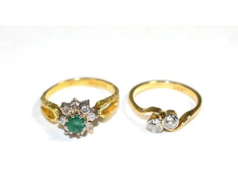 An diamond two stone ring, two old cut diamonds in milgrain settings, to bypass shoulders, total estimated diamond weight 0.3