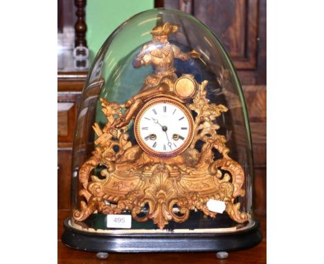 A French gilt metal mantle clock, under glass dome