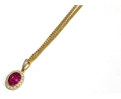 A ruby and diamond pendant, an oval-shaped cluster of calibré cut rubies in a rubbed over setting, within a border of round b