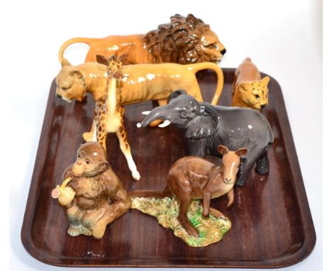 Beswick Wild Animals Comprising: Lion - Facing Right, model No. 1506, Lioness - Facing Left, model No. 1507, Lion Cub - Facin