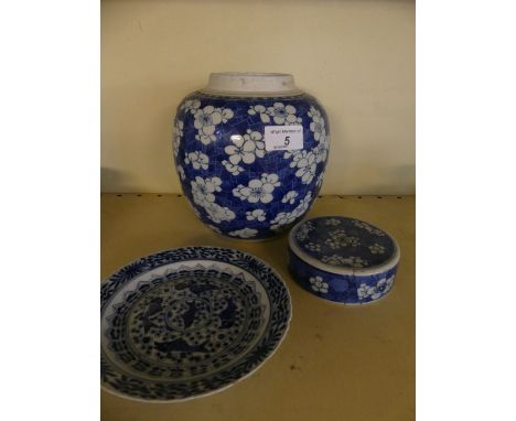 A late 19th/early 20th Century Chinese ginger jar decorated in the Prunus flower pattern, together with a further small blue 