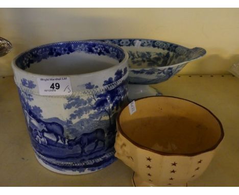 A 19th Century blue and white oval pedestal bowl, decorated with a rural view, together with a 19th Century blue and white cy