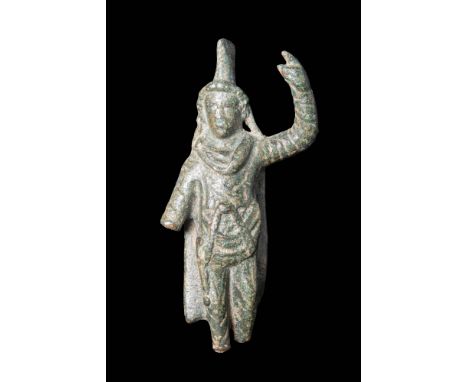 Ca. AD 100 - 300.A rare and quite remarkable bronze statuette of a cautes or cautopates, an attendant of the sun god Mithras.
