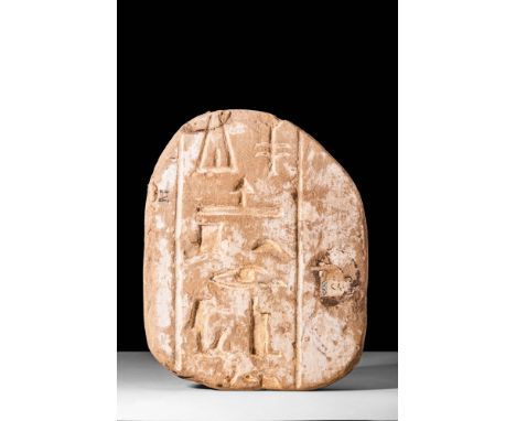 Middle Kingdom, Ca. 2050-1786 BC.A carved sandstone panel section featuring a partial vertical register of incuse carved hier
