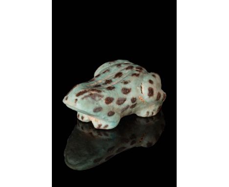 Ca. 1069 - 664 BC.An exceptional faience frog-shaped amulet crafted in a naturalistic manner, featuring a surface adorned wit