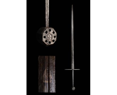 Ca. AD 1400 - 1600.A very rare and impressive medieval knights sword with a central fuller, simple crossguard, and octagonal 