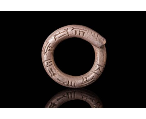 Ca. 700 BC.A silver hair ring with tubular section inscribed with cuneiform characters.Size: D:16.31mm / US: 5 3/4 / UK: L; W
