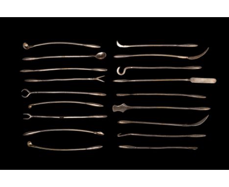 Ca. AD 100 - 300.A collection of silver surgical instruments, including knives, spoons, hooks, and various instruments likely