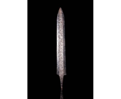 Ca. AD 800 - 1000.A beautifully formed iron Damascus steel sword. The blade is double edged with a triangular tip and a long 