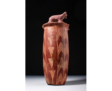 Naqada, Ca. 3600 BC. An exceptionally rare tubular ceramic vessel with a flat base, rounded walls and a tapered lower section