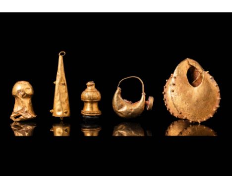 Ca. 300 - 100 BC.A collection of five ancient gold ornaments. The first on the left is a bell-shaped piece with smooth contou