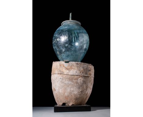 Ca. AD 100 - 300.A funerary vessel used for holding cremated human remains called a cinerarium (or cinerary urn) that is hand